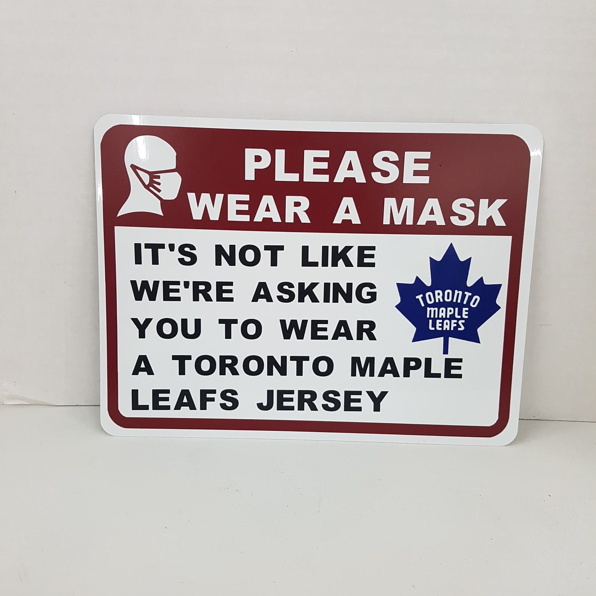 funny sign wear a mask it's not like we are asking you to wear toronto maples leafs jersey