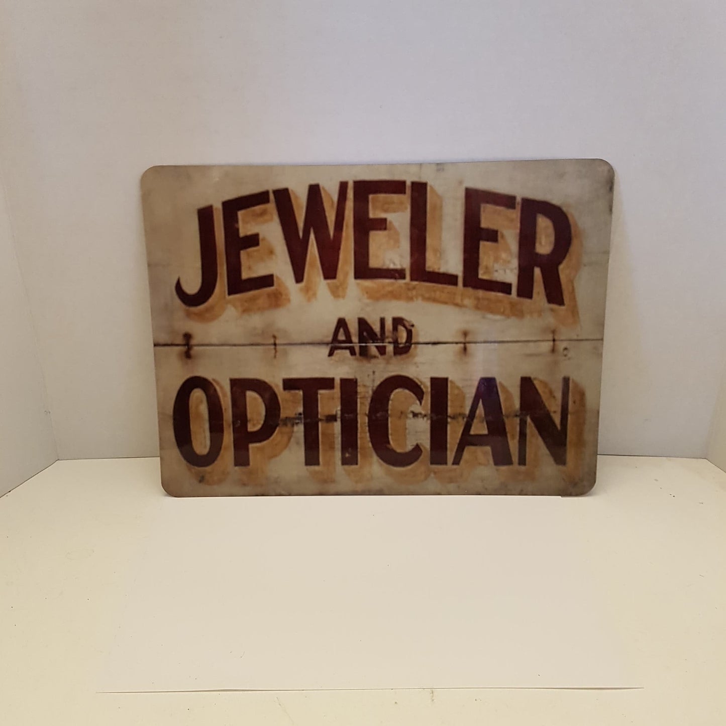 sign antique jeweler and optician