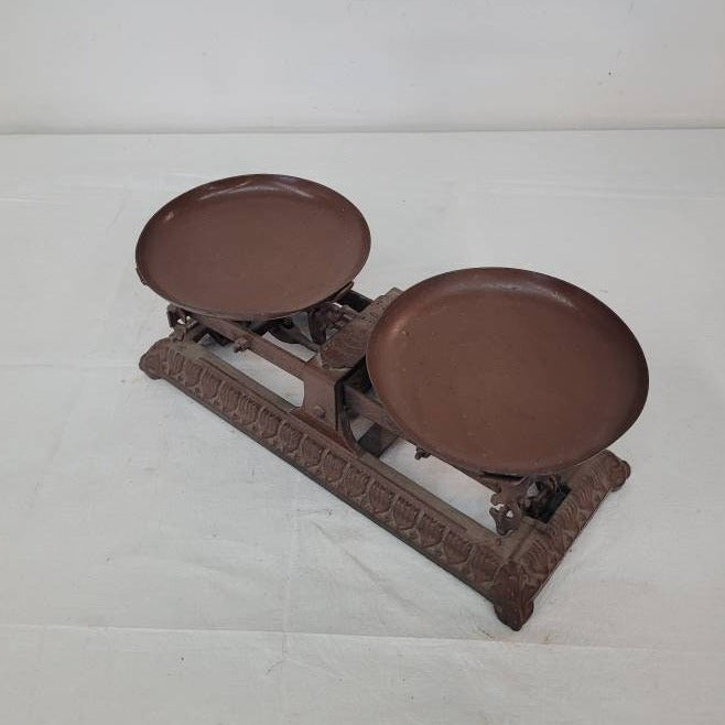 antique balance scale cast iron with two dishes