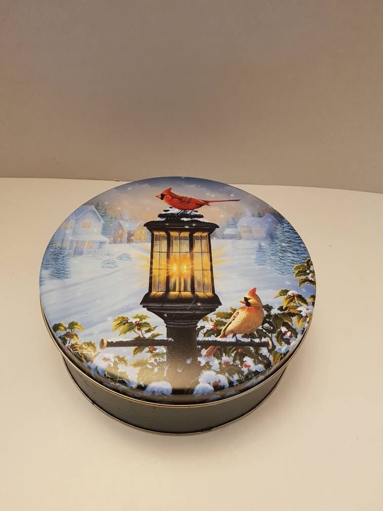 vintage tin can with cardinal antique storage container / box