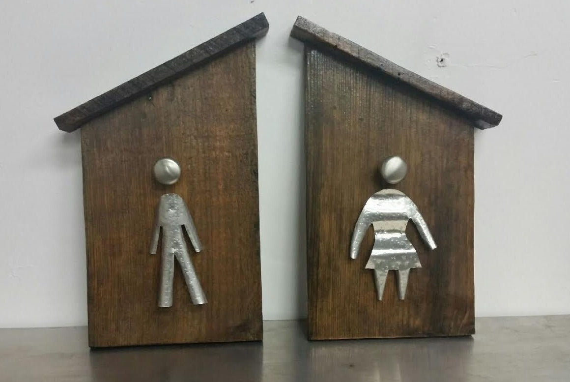 mens and womans bathroom restrooms sign