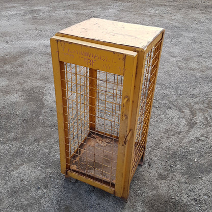 Versatile industrial metal wire cage – perfect as end table or lamp stand.
