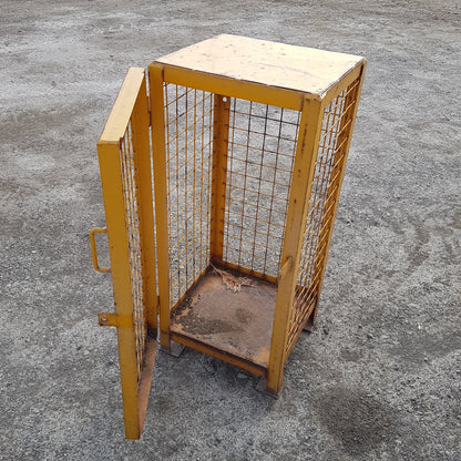 Versatile industrial metal wire cage – perfect as end table or lamp stand.