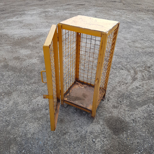 Versatile industrial metal wire cage – perfect as end table or lamp stand.