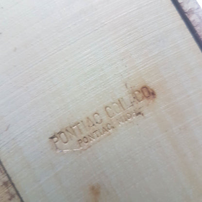 Antique Pontiac wooden T coil with embossed Pontiac Coil Co., Michigan.
